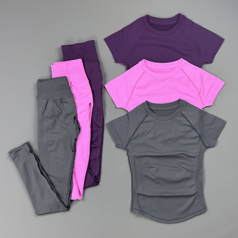Yoga Fitness Kleidung - ชุดออกกำลังกาย 2 ชิ้นสำหรับผู้หญิง เสื้อกีฬาแขนสั้นแบบแร็กแลน กางเกงเลกกิ้งเอวสูงไร้ตะเข็บ ผ้ายกกระชับสะโพก